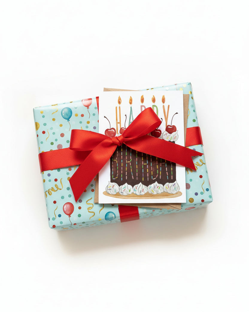 Birthday card with a cake design, candles, and the text 'Happy Birthday' on a white background.