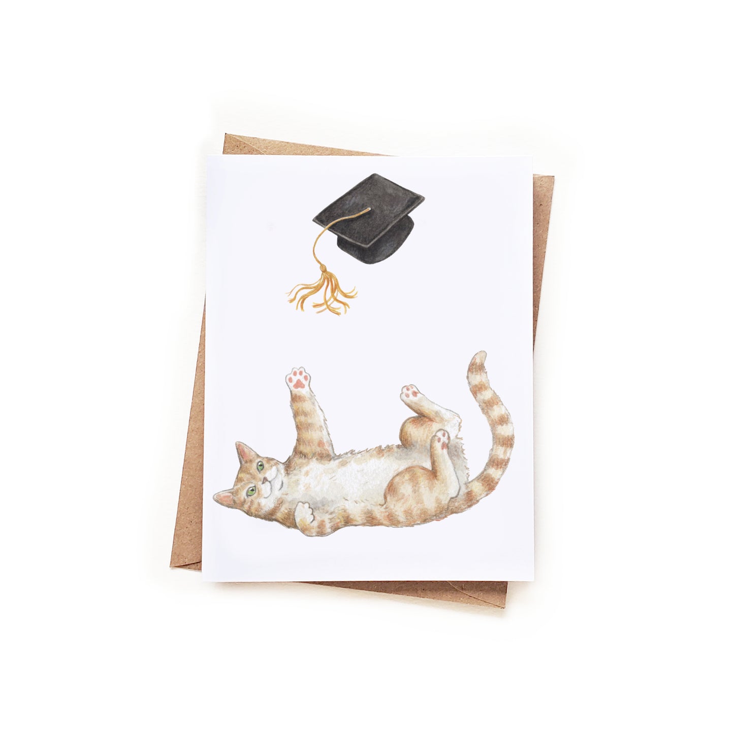 Greeting card with a cat and graduation cap on a white background